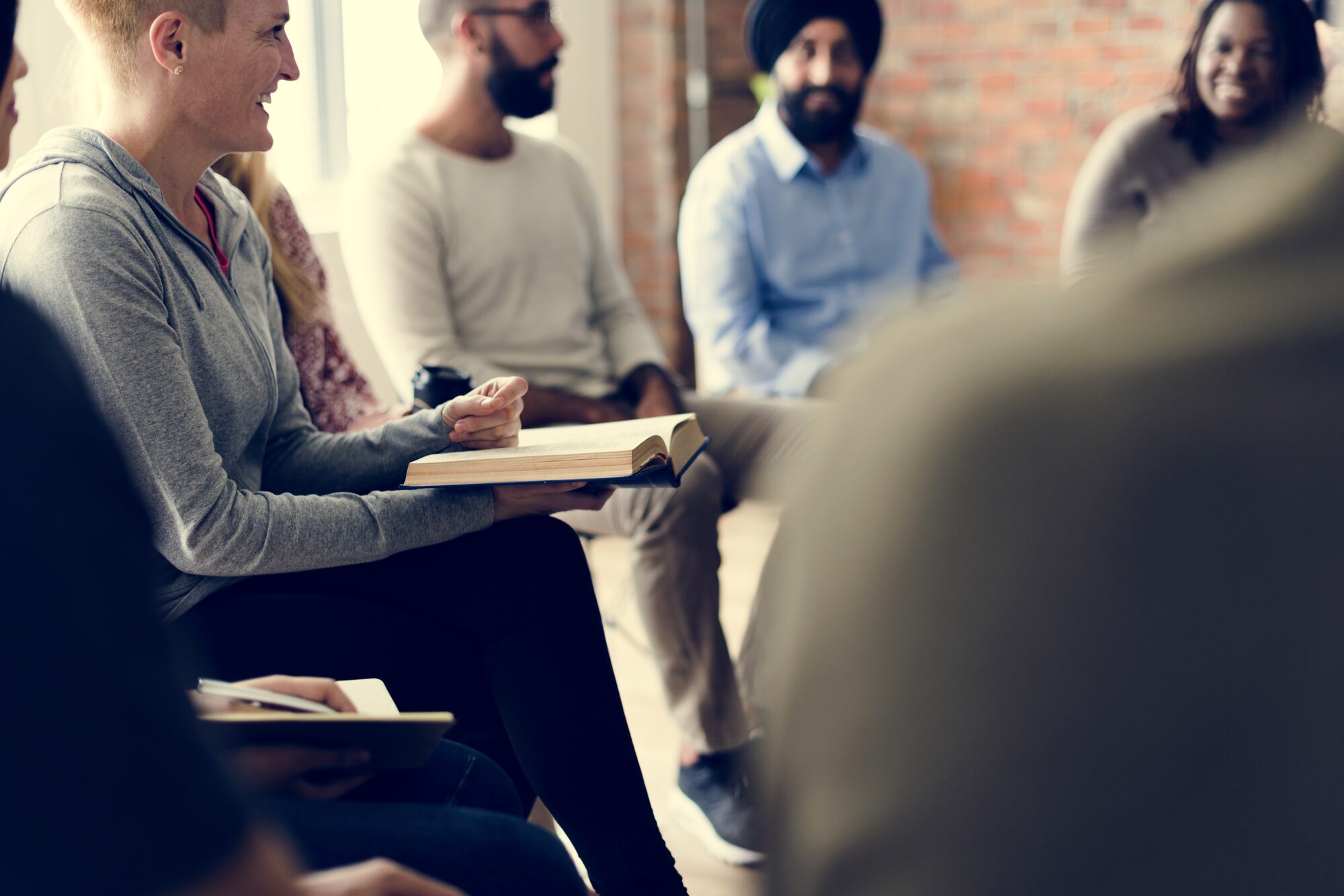 Certified Professional in AI Security 3 Security professionals at a technical seminar