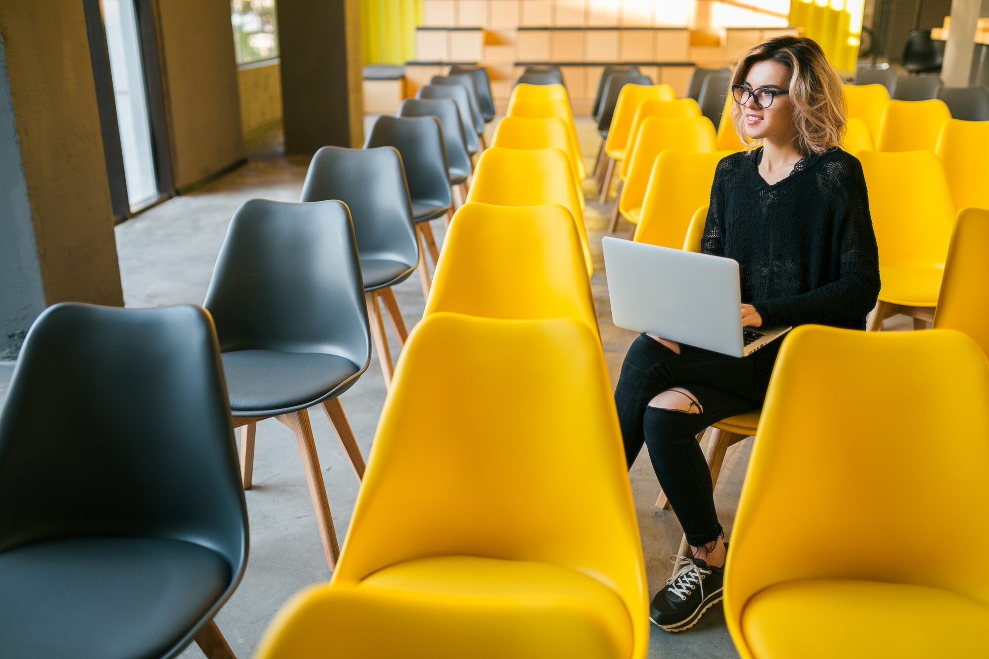 Student working in a lecture hall